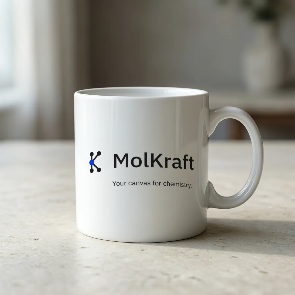 A white mug printed with the MolKraft logo and Your canvas for chemistry.